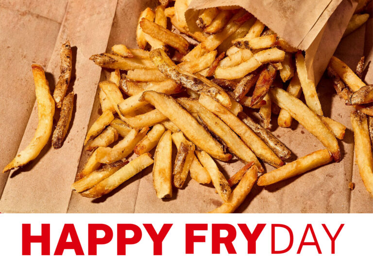 A National Fry Day graphic from Five Guys featuring a top-down photograph of Five Guys fries laid across a brown paper bag.